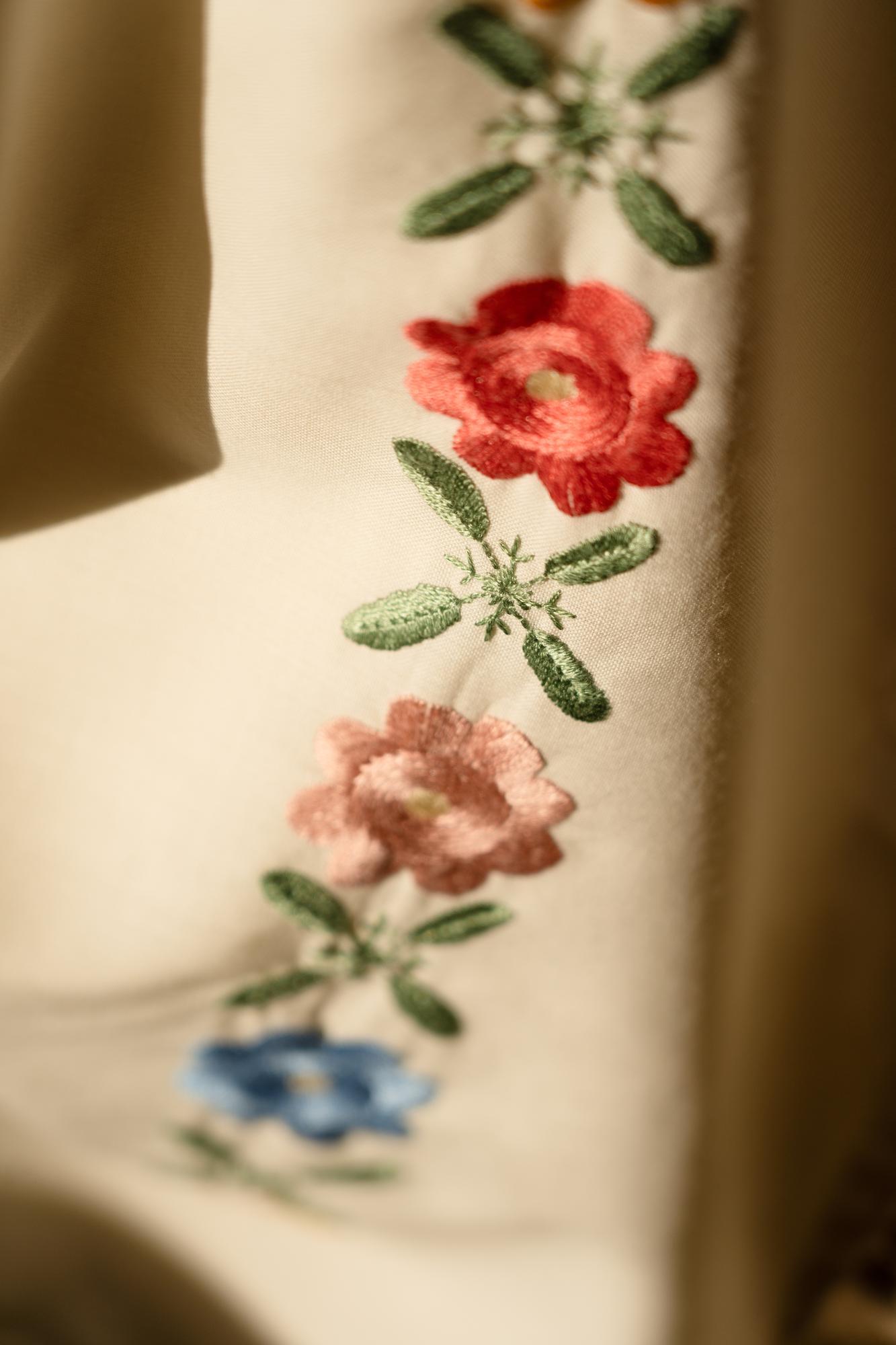 embroidered botanical sampler on natural linen
